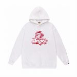 A Bathing Ape (BAPE) camo pullover hoodie red